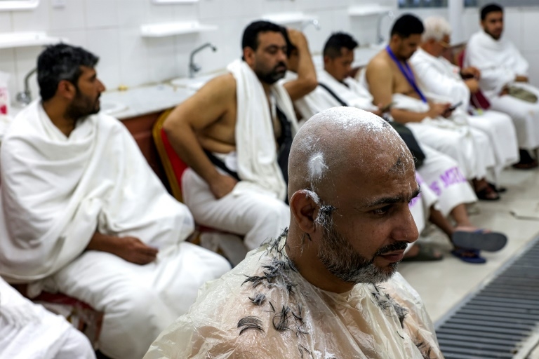 Inside Saudi's hajj-only barbershop, shaving thousands of heads in a day