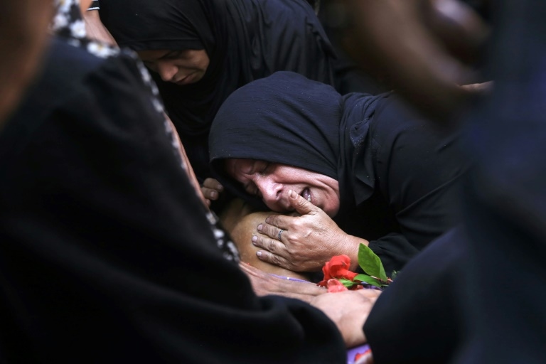 Gaza civil defence says Israeli fire kills 32 near two aid centres