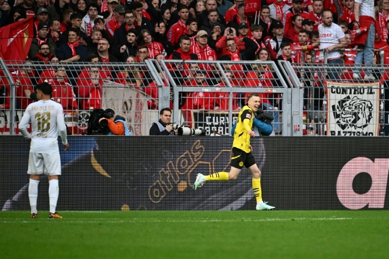 Dortmund beat Mainz to keep European hopes alive