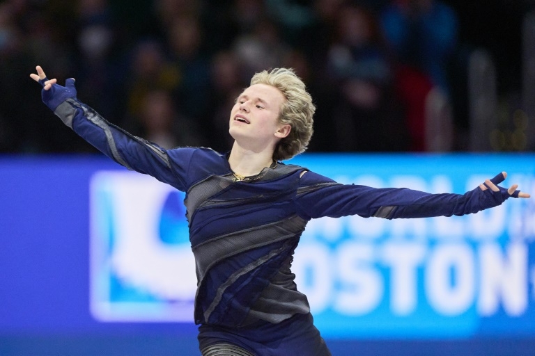 Standing ovation as defending champ Malinin grabs world figure skating lead