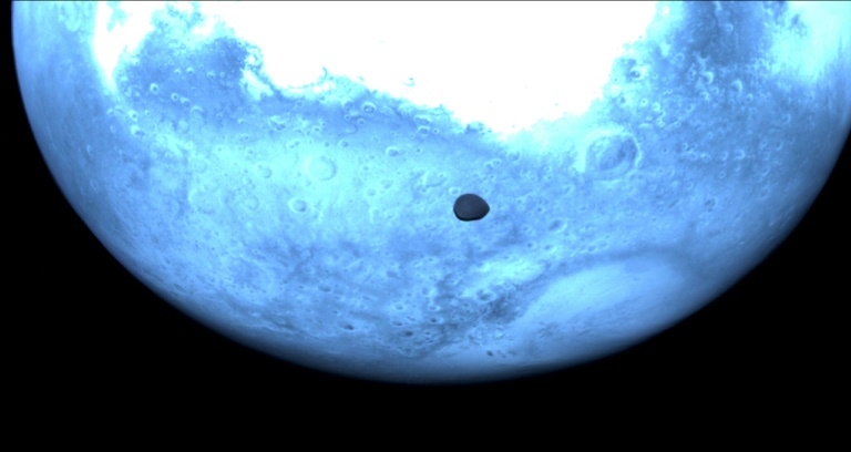 Asteroid probe snaps rare pics of Martian moon
