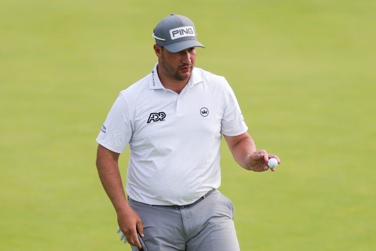 Lawrence shares sixth as second round ends at rainy US Open
