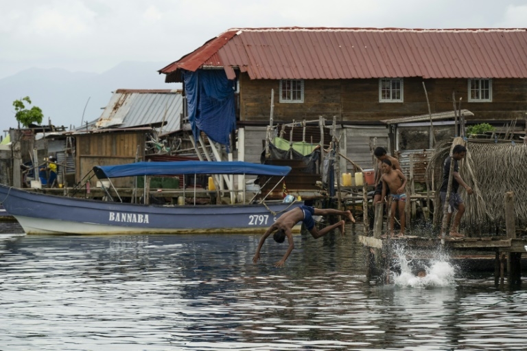 Year after exodus, silence fills Panama island threatened by sea