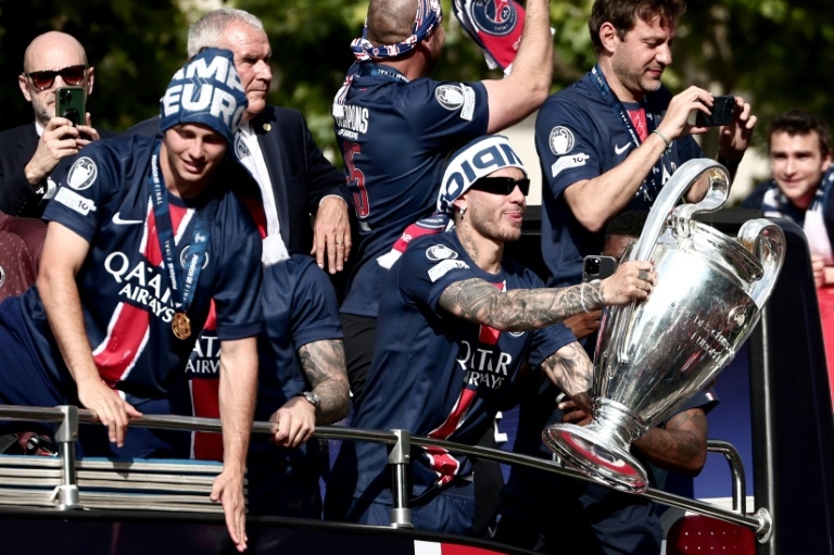 Jubilant PSG parade Champions League trophy in Paris