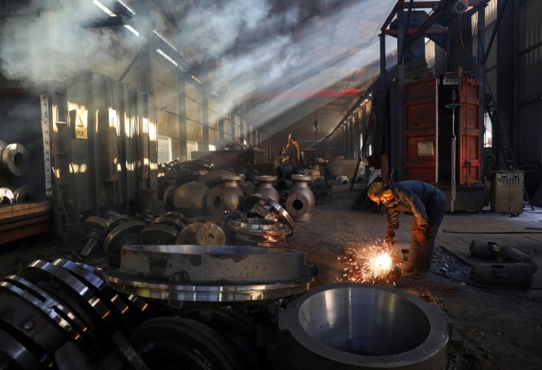 China's exports slow as trade war takes toll