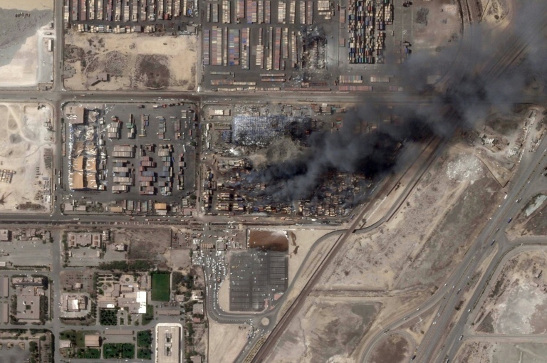Iran says fire contained after deadly blast at key port