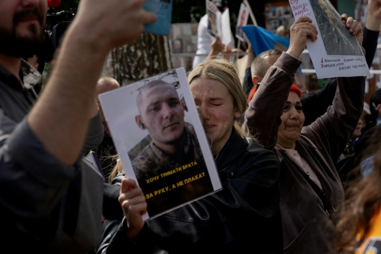 Ukrainians beg for news of missing soldiers as prisoners return