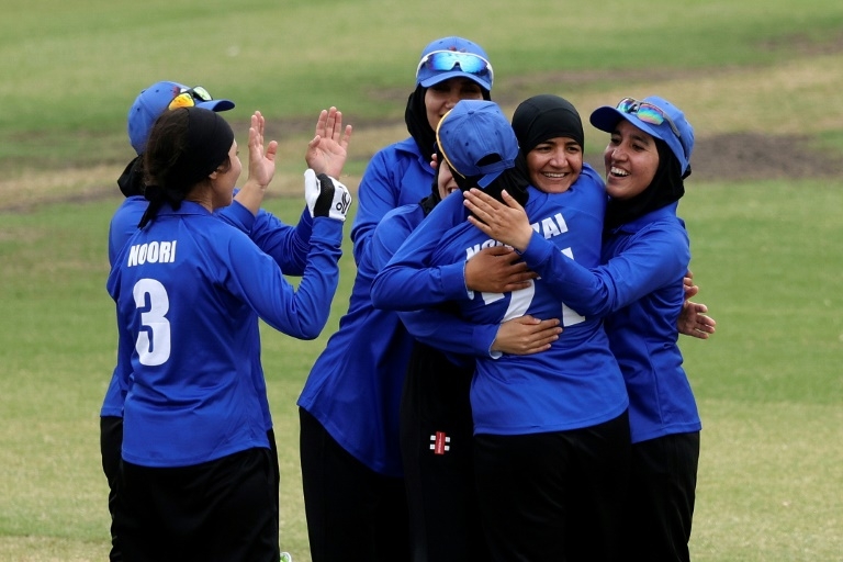 Afghan women cricketers reunite in first game after fleeing Taliban