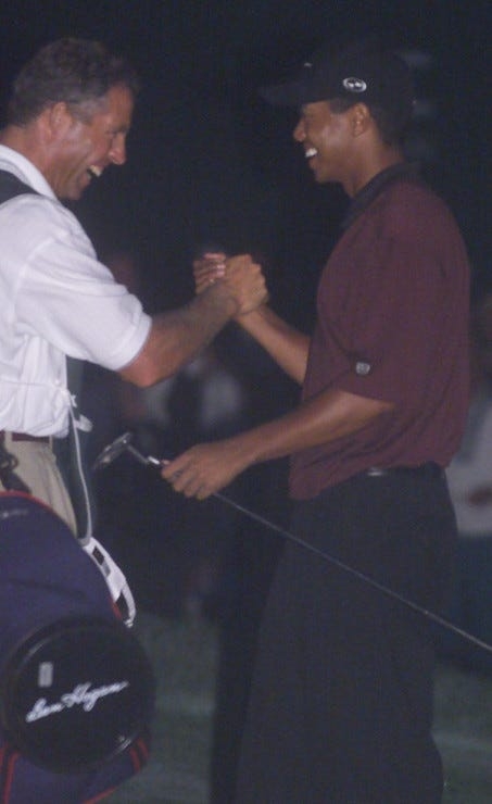 Send us your memories of Tiger Woods' 'Shot in the Dark' at Firestone Country Club