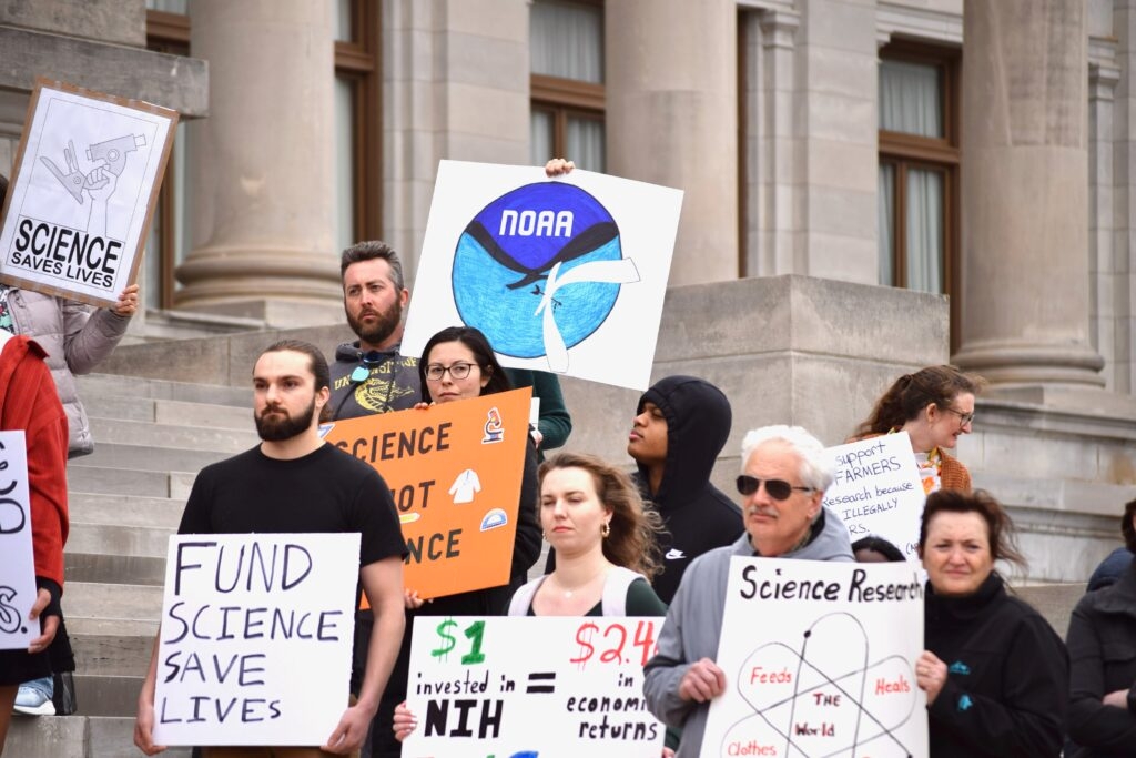 Fired federal workers keep up pressure to regain jobs as courts order them rehired