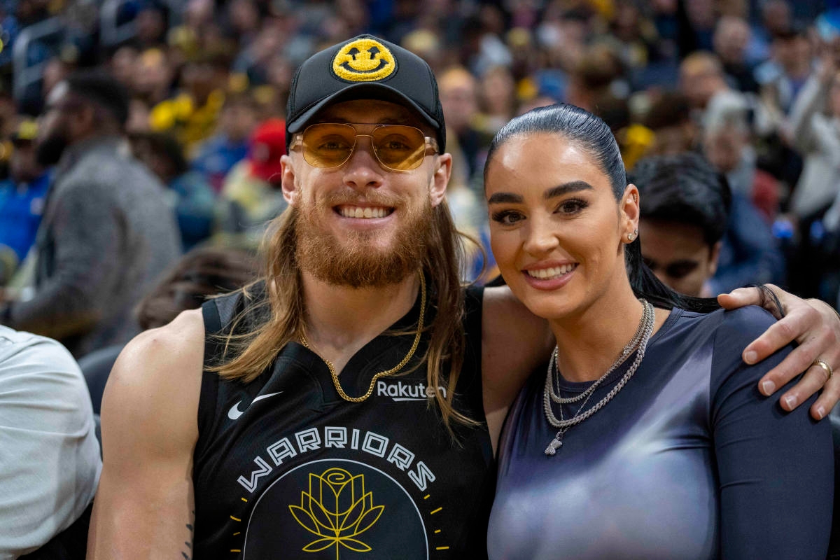George Kittle's Wife Turns Heads with Sexy Leopard Print Outfit During Trip to France