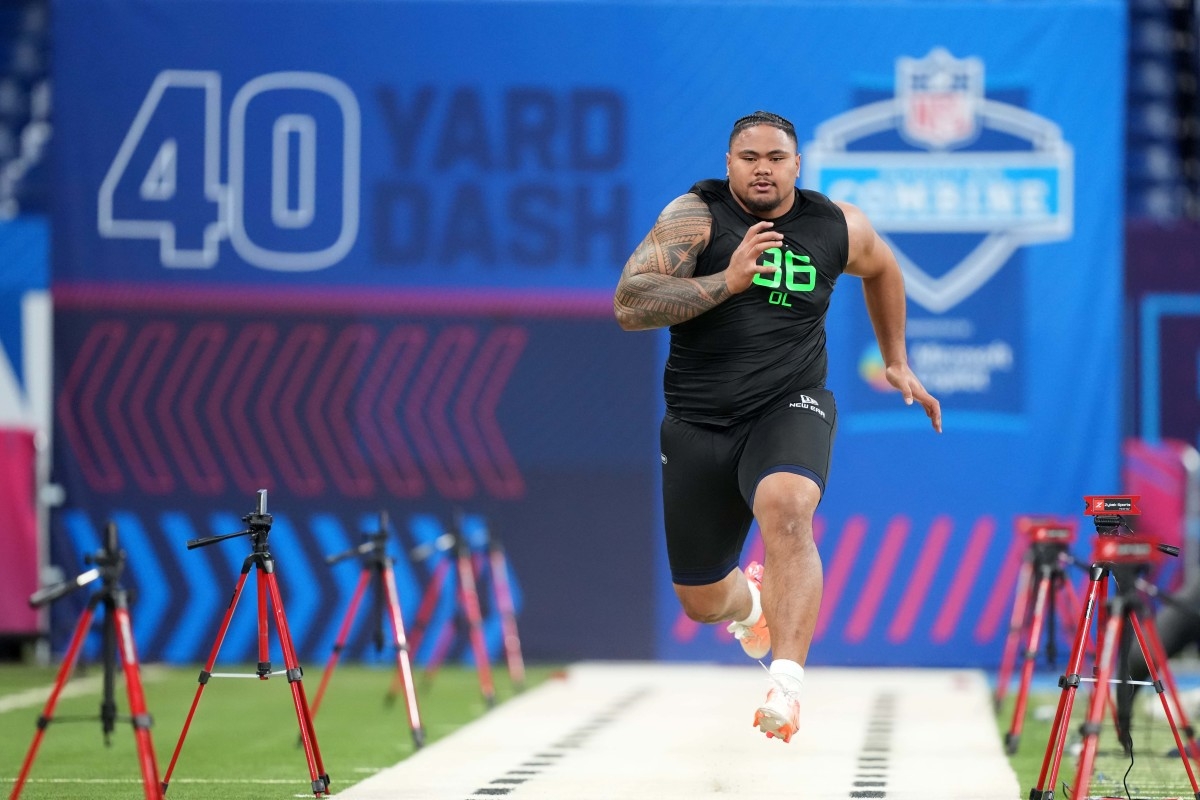 Dolphins' Jonah Savaiinaea Praised by Coaches Early