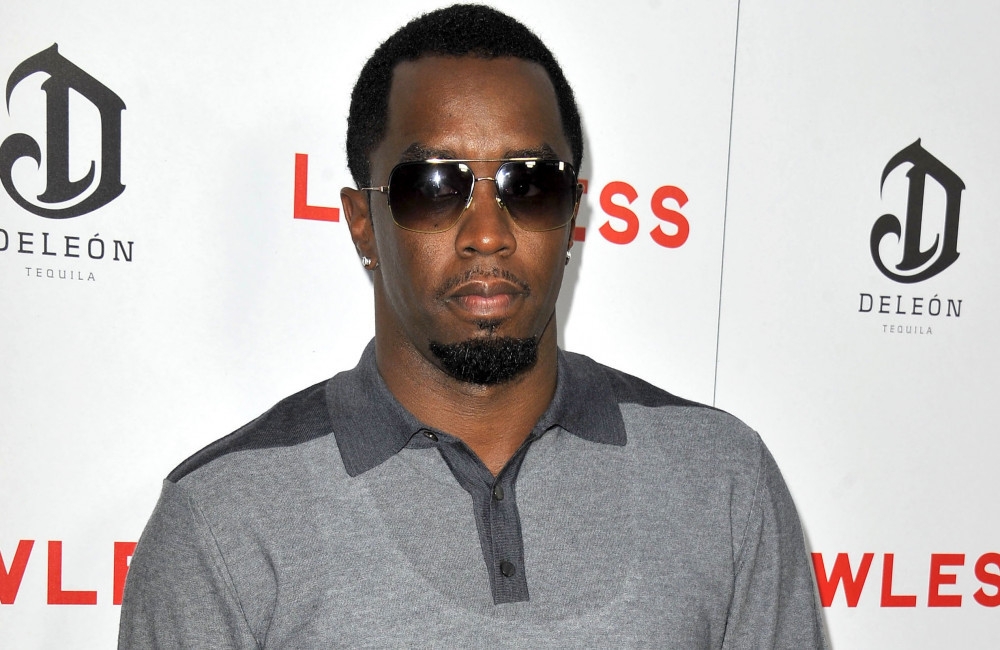 Sean Combs reading self-help book during trial