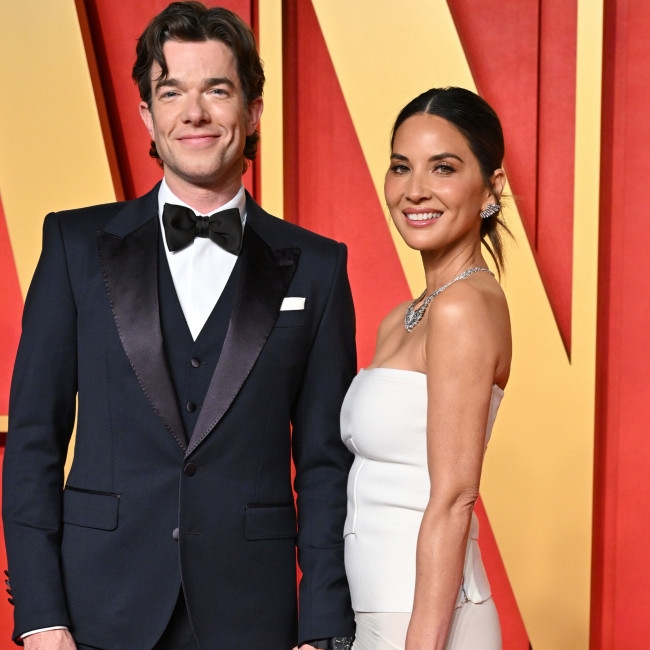 John Mulaney blasts 'violent threats' to Olivia Munn and their young family
