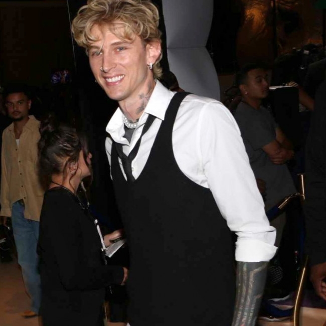 Machine Gun Kelly leaves American Music Awards early because baby daughter has a 'fever'