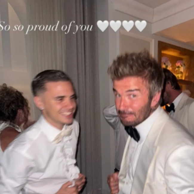 Romeo Beckham is 'so, so proud' of his dad David for receiving a knighthood