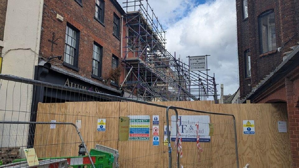 Path to shops to open four months after cafe fire