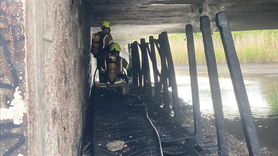 Train disruptions after fire under bridge