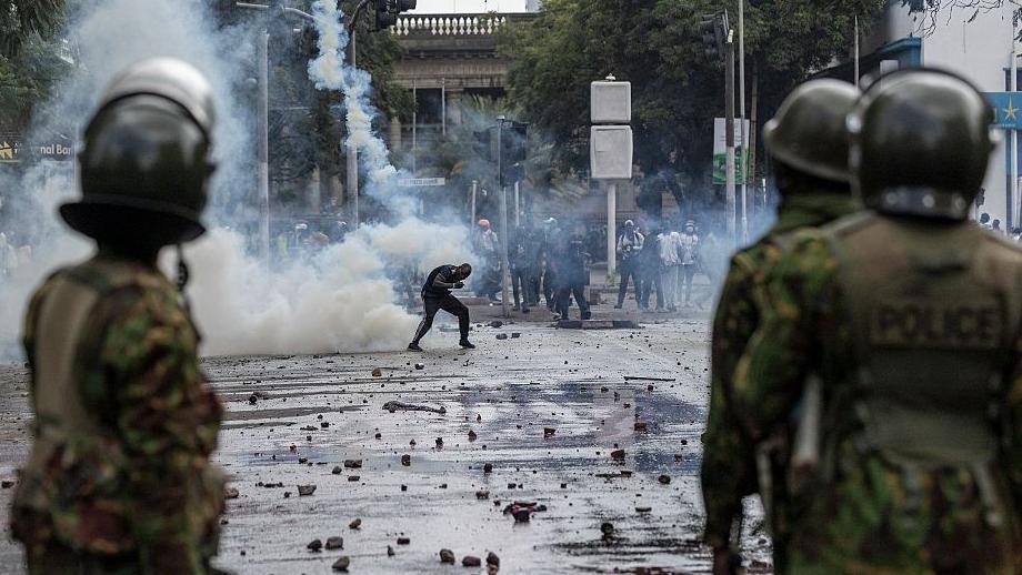 Kenyan minister back police over protests, which he calls 'coup attempt'