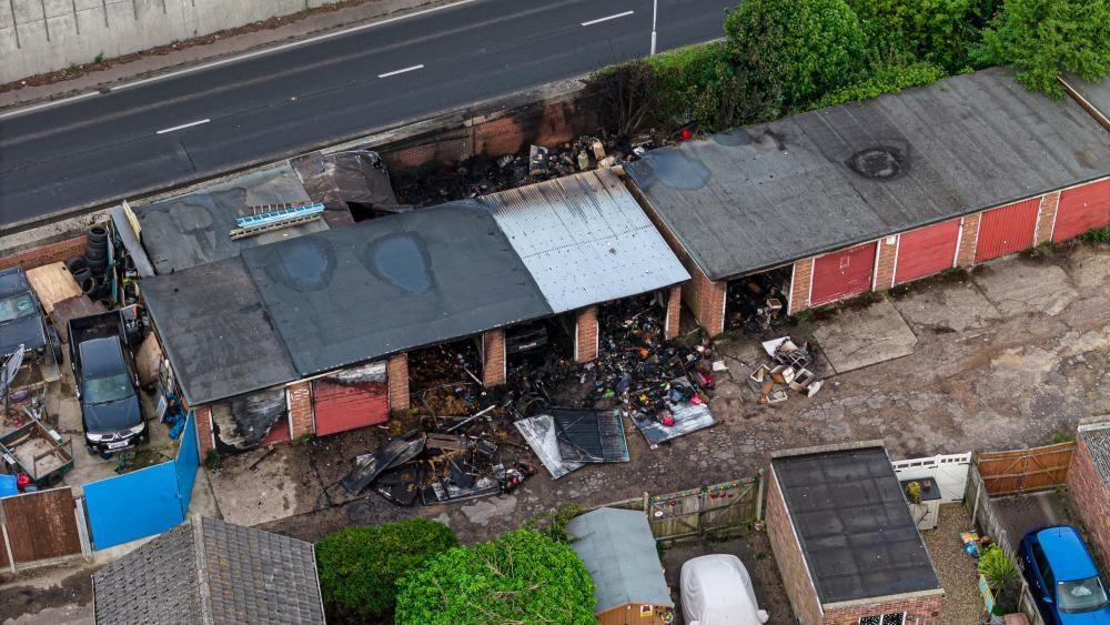 Fire causes extensive damage to row of garages
