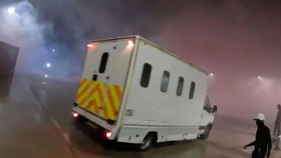 Five people charged over alleged defence firm raid
