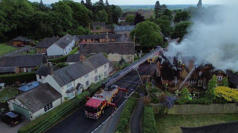 Thatched roof blaze caused by lorry hitting cables