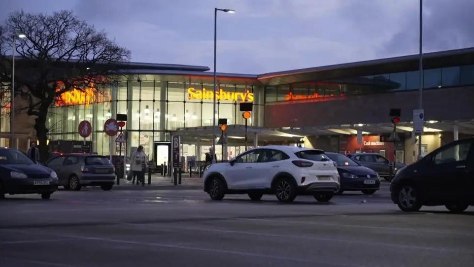Assault charge after police officer hit by car