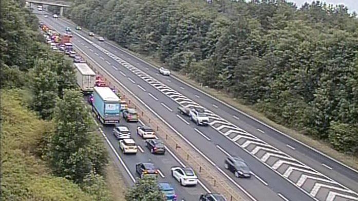 A14 lanes reopen after crash and oil spill