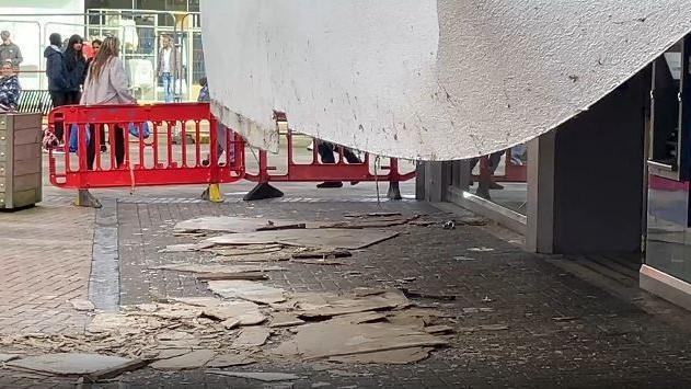 Plasterboard collapses on to shops in town centre