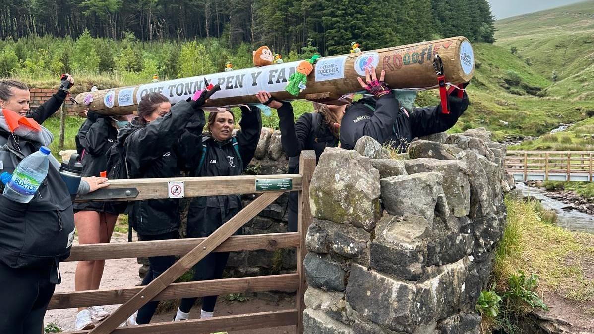 Gym equipment lugged up mountain for charity