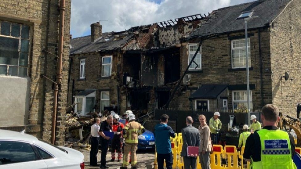 Gas canisters found in house explosion wreckage