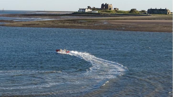 Two rescued after being thrown from water bike