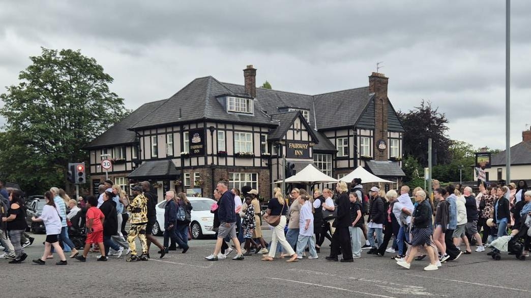 March against knife crime held after boy's death