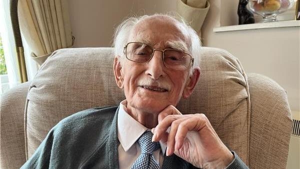 102 year old war veteran and former POW says he's the "luckiest man that ever lived"