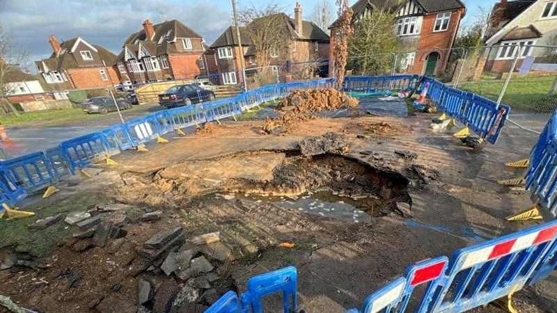 Date to fix sinkhole outside homes not yet set