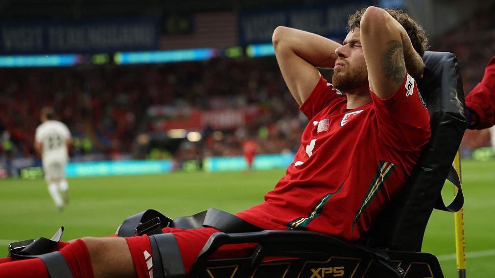 Williams out of Belgium tie as Wales call up Lawlor