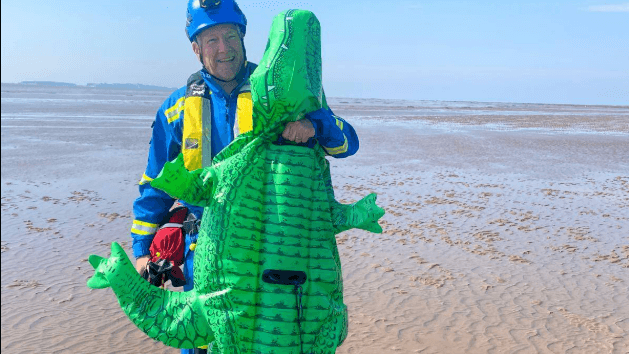 Two women on inflatable crocodile rescued from sea