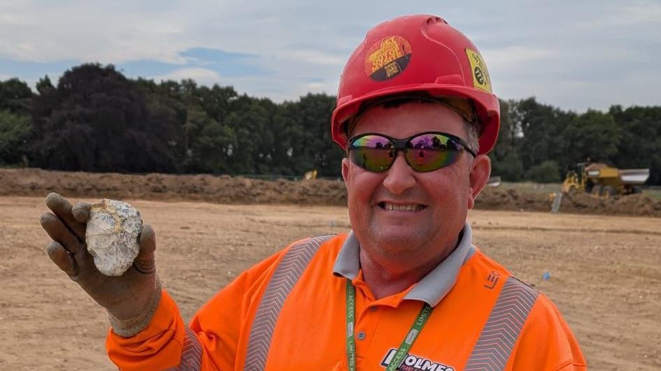 Man finds prehistoric handaxe on his tea break