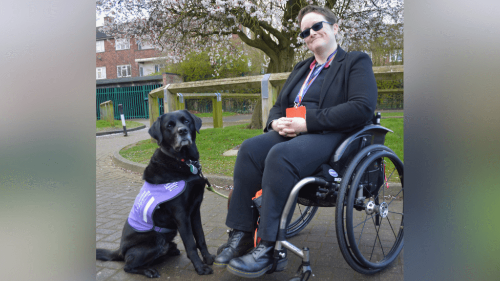 Disabled teacher says dog is 'lifeline' in her science lab
