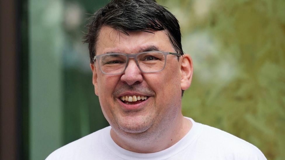 Father Ted creator denies harassing trans woman
