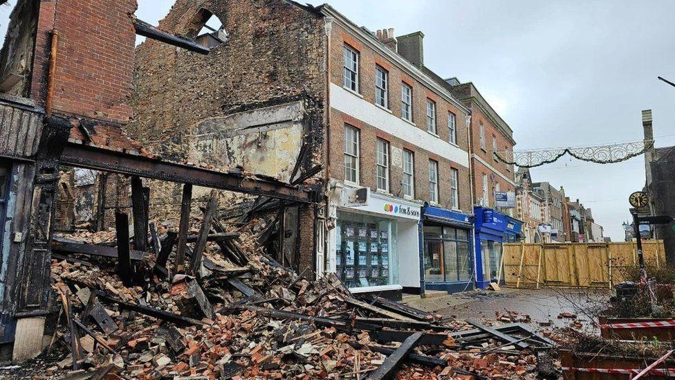 Clear-up to begin at fire-gutted collapsed cafe