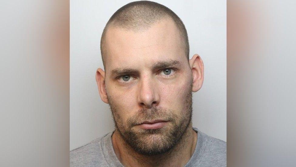 Trial date set for prison hammer-attack suspect