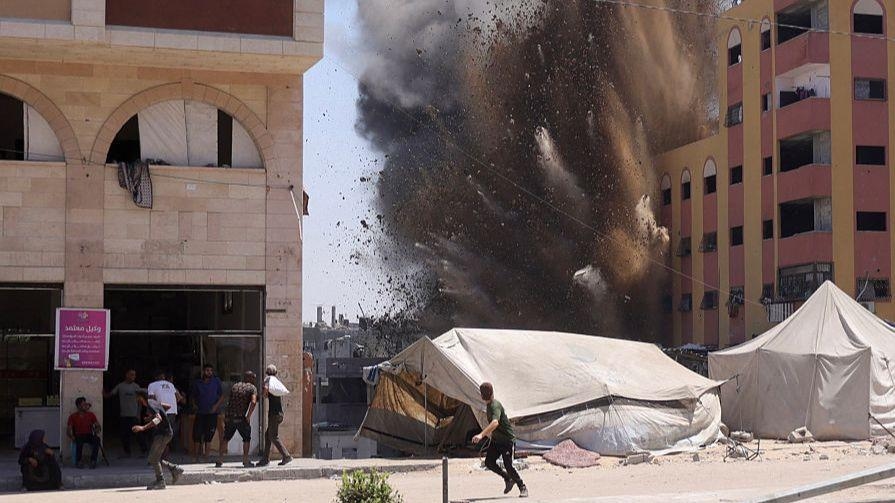 Palestinians flee Gaza City as Israel says first stages of assault have begun