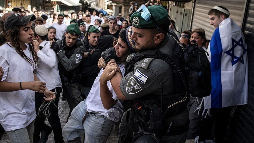 Far-right marchers attack Palestinians as Israel marks taking of Jerusalem