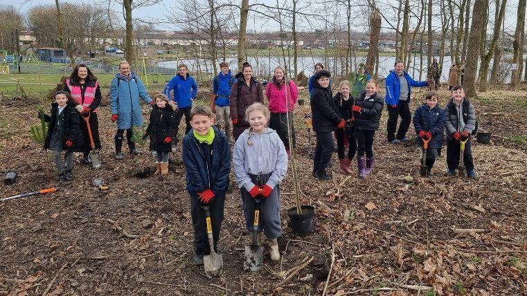 Pupils plant replacements for dying trees