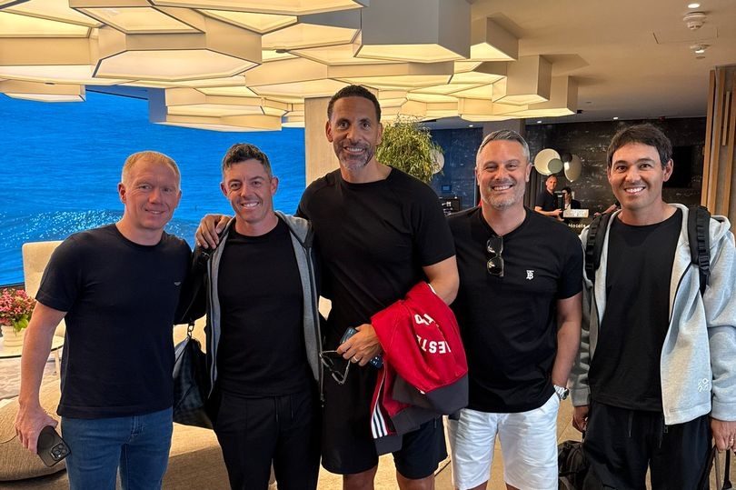 Rory McIlroy poses with Man United legends and rival fans in Bilbao ahead of Europa League final