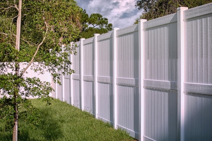 Georgia Homeowner Says Neighbor Replaced 'Rotting' Shared Fence Without Permission — Then Demanded $2,000 While He Was 6 Feet Up A Tree