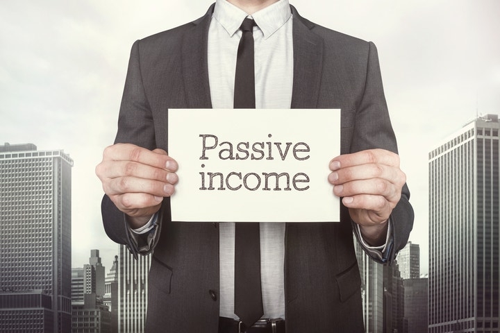 Here's How You Can Earn $100 In Passive Income By Investing In Postal Realty Trust Stock
