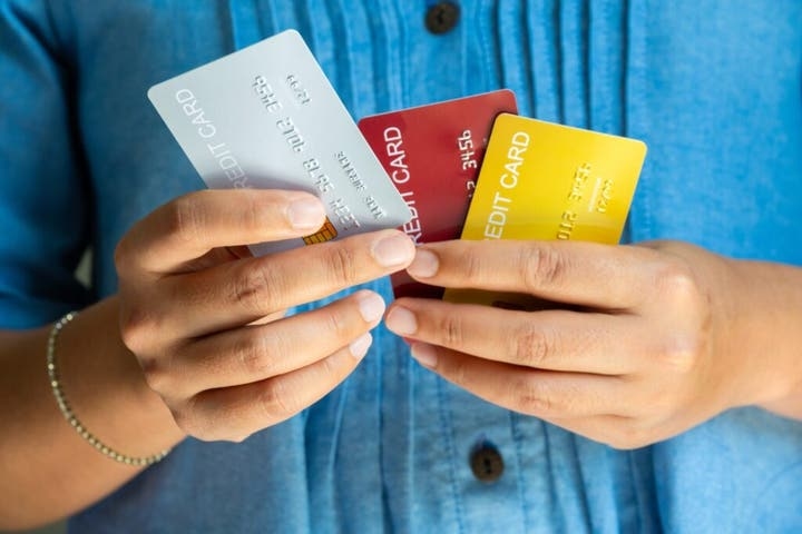 How to Spend Bitcoin (and Other Crypto) in Person Using a Debit Card in 2025