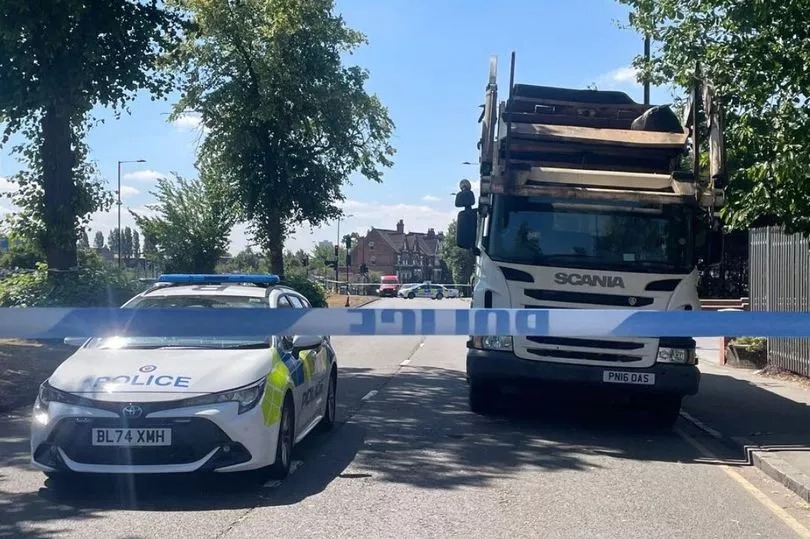 Pedestrian hit by bin lorry as driver speaks to police at scene
